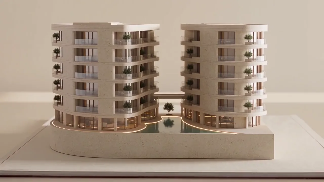 A detailed travertine architectural model on an ivory presentation folio